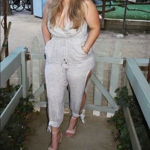 romper wirh open leg cuts, beautiful details